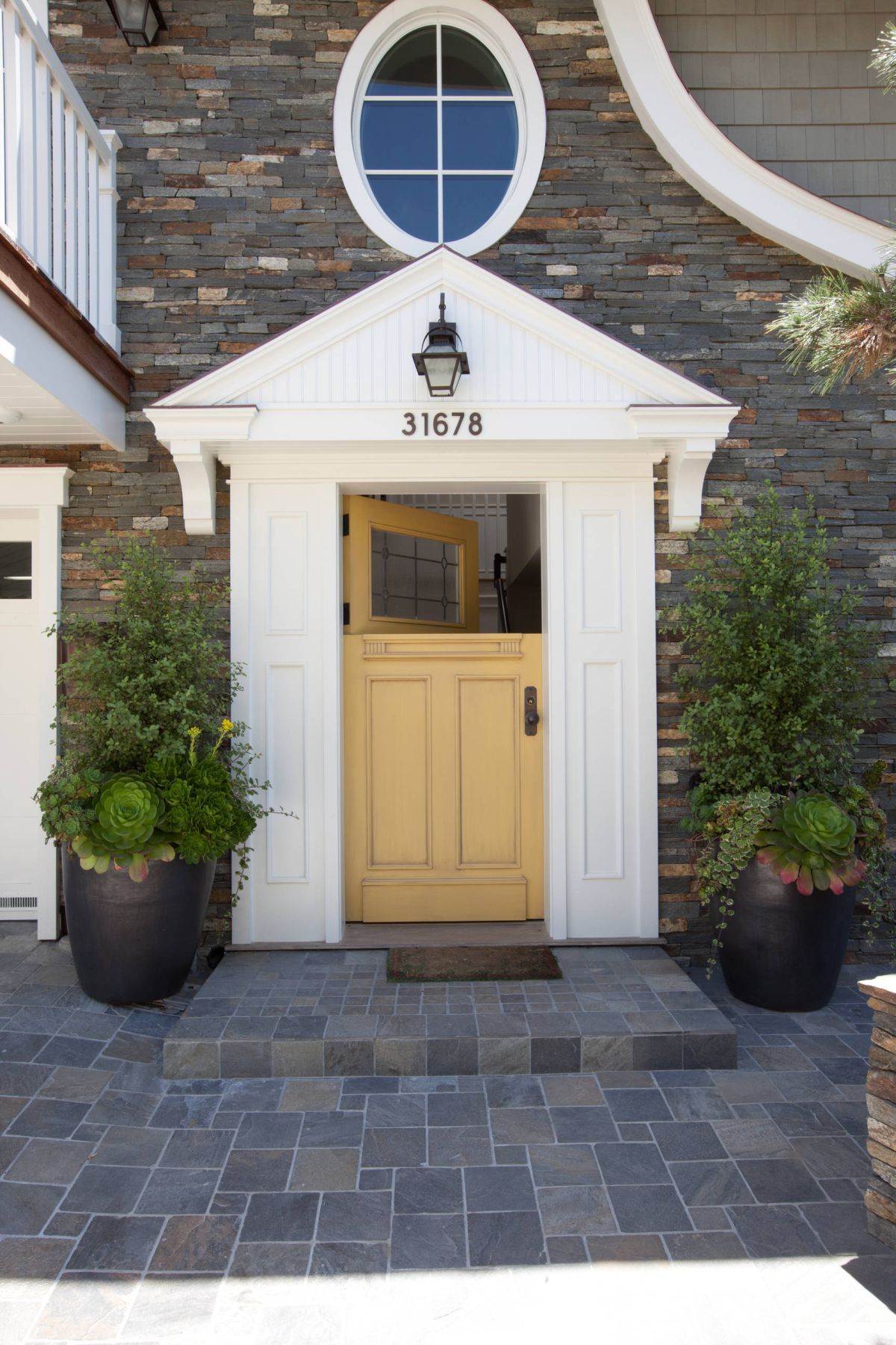 Traditional exterior yellow dutch door style