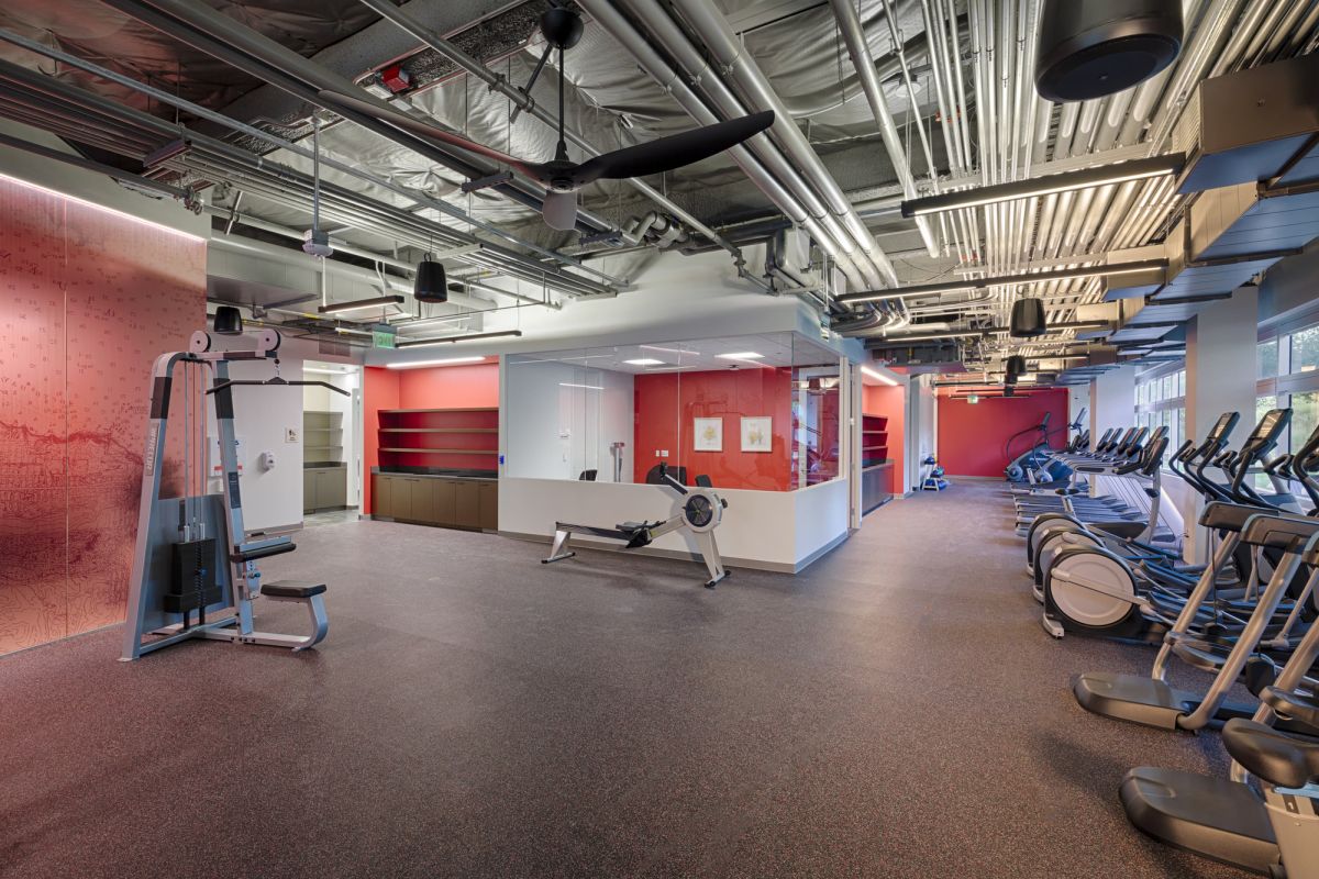 The fitness center maintains a slightly rugged look but also feel warm and inviting